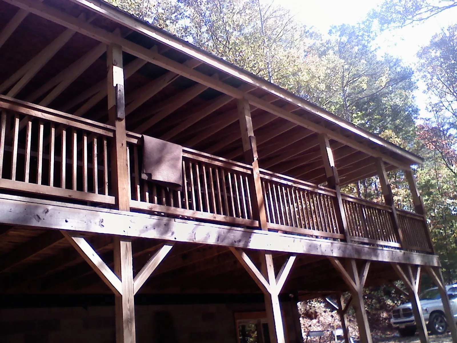 Timber framing under a new elevated porch and deck — Roof Leak Repair in Hanford by Roofing Brothers
